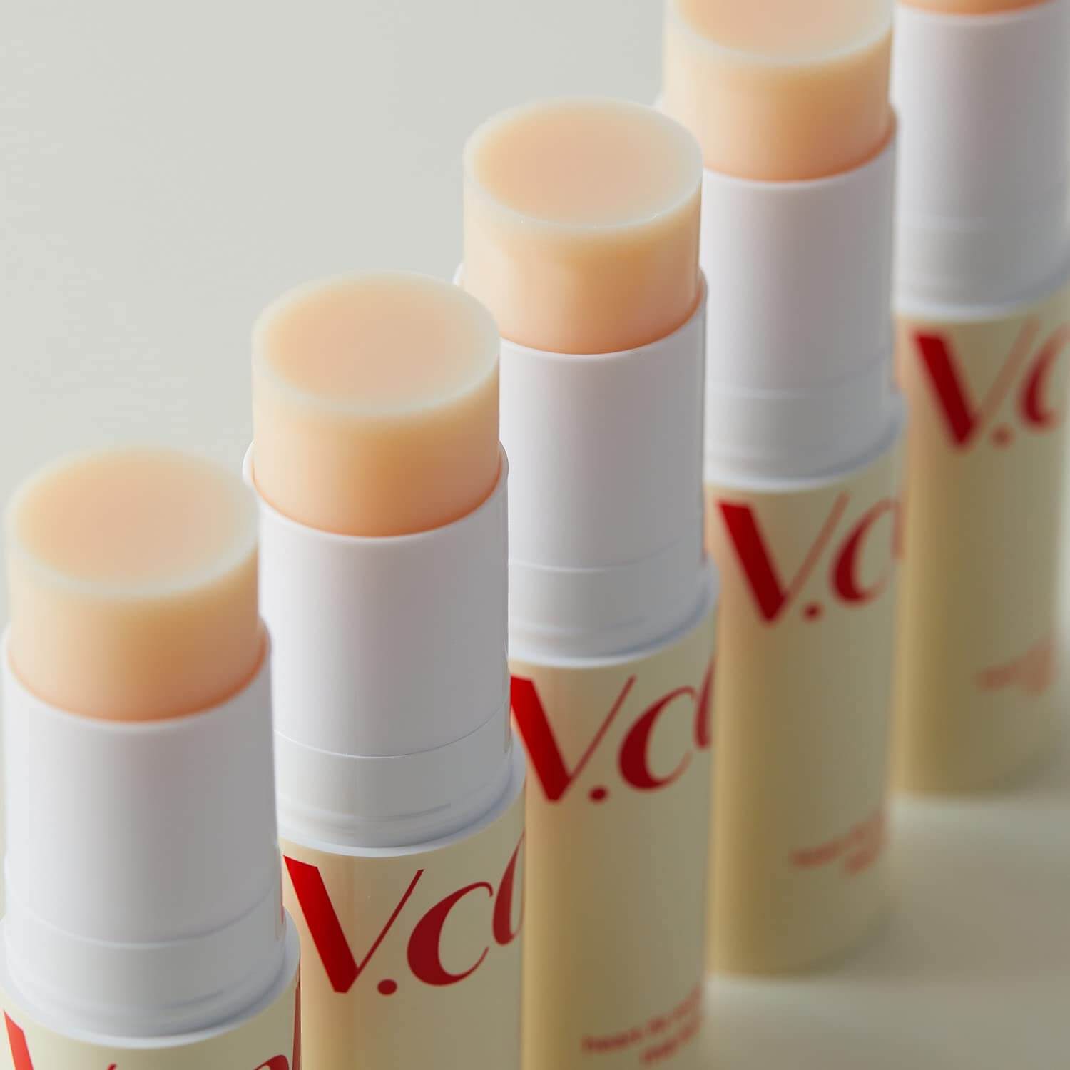 Line of MA:NYO V Collagen Heart Fit Multi Balm 10g tubes showing creamy texture.