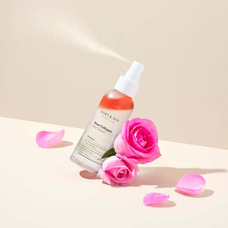 MARY & MAY Marienmay Rose Collagen Mist Serum with pink roses in a minimalistic setting