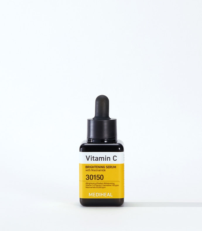 MEDIHEAL Vitamin C Brightening Serum 40ml bottle with dropper featured against a white background, showcasing skincare product packaging.