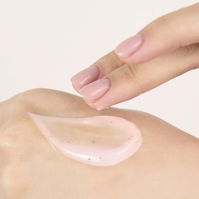 Application of MEDITHERAPY Philizio Pink Retinol Shot Serum 30ml on skin with a gentle touch showcasing the creamy texture