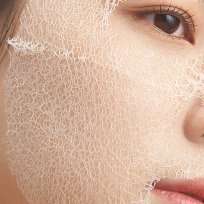 Close-up of a person wearing MEDITHERAPY Wrinkle-Fit Mask showcasing its texture and skin application.