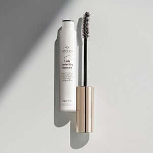 MISSHA No-Retouch Correction Cara - Lash correcting mascara on a white surface