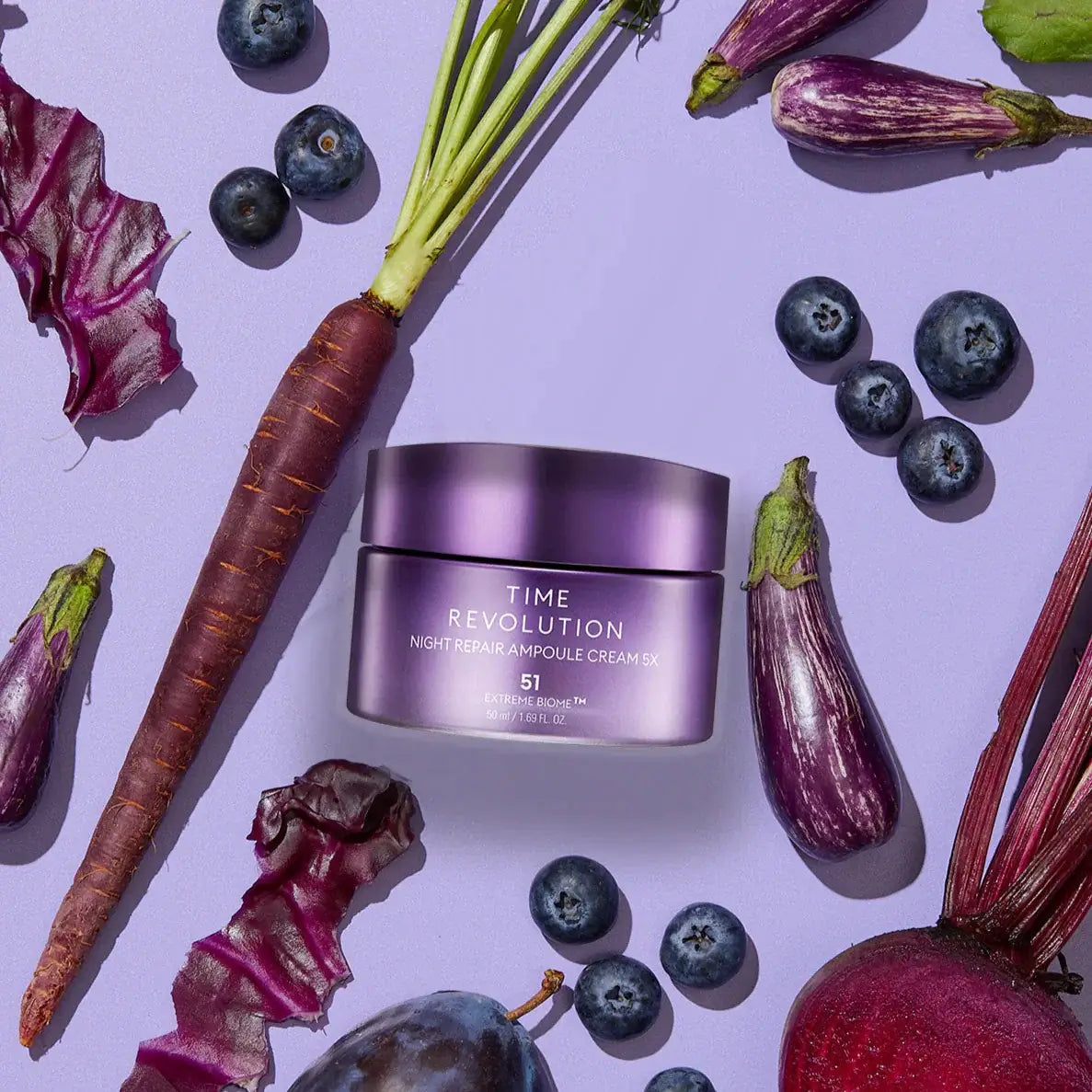 MISSHA Time Revolution Night Repair Ampoule Cream 5X 50ml surrounded by fruits and vegetables.