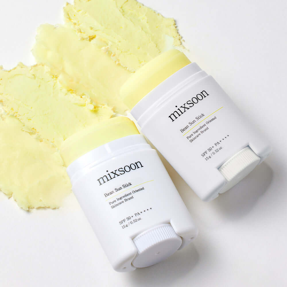 MIXSOON Bean Sun Stick SPF 50+ PA++++, yellow sun protection stick, skincare product displayed on white surface