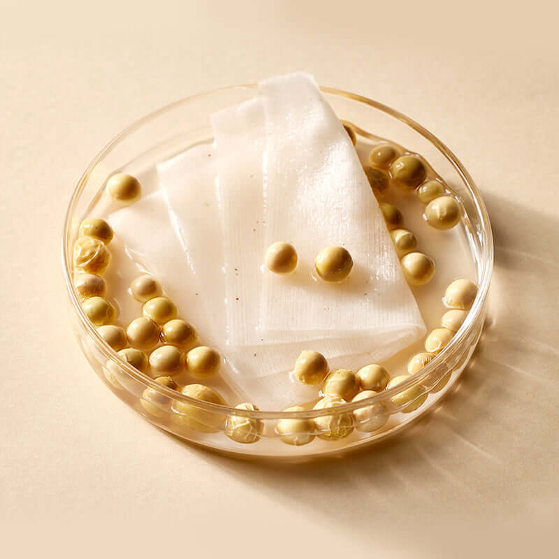 MIXSOON Bean Toner Pad in a bowl showcasing toner pads with soy extracts for skincare.