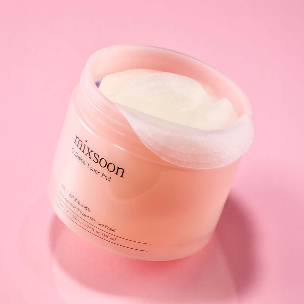MIXSOON Collagen Toner Pad container with open lid on a pink background, showcasing the skincare product's soothing and hydrating pads.