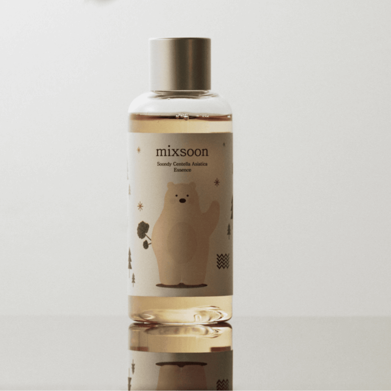 MIXSOON Soondy Centella Asiatica Essence 100ml bottle on reflective surface with neutral background.