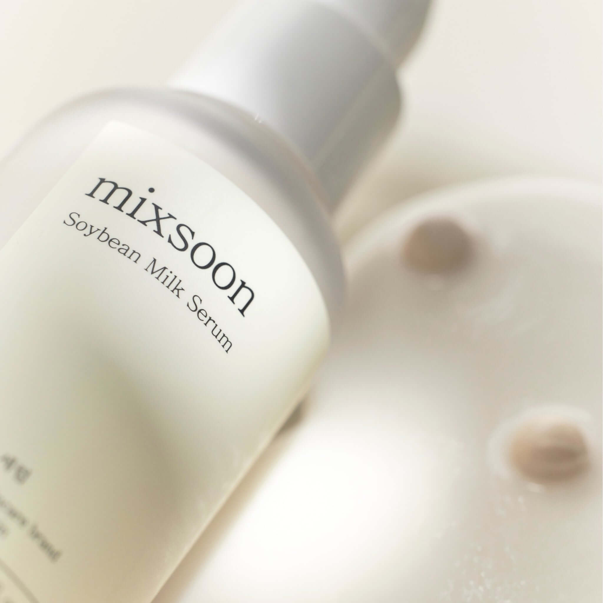 MIXSOON Soybean Milk Serum 50ml bottle close-up on creamy texture surface