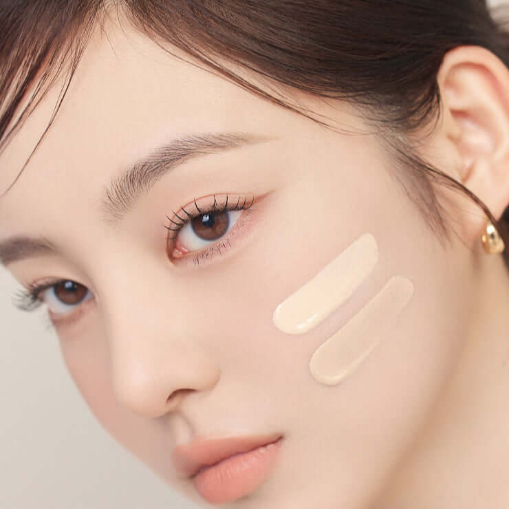 Woman applying MUDE Soft Silky Fit Cushion makeup, highlighting its smooth texture and perfect blend for a flawless complexion.