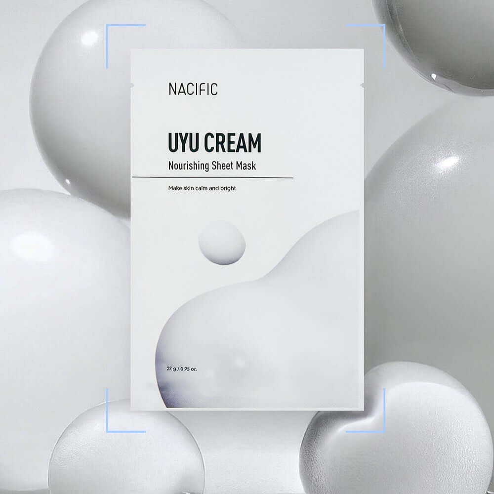 NACIFIC Milk Cream Nourishing Mask Pack packaging displayed amidst white cream-like spheres, emphasizing skincare benefits.