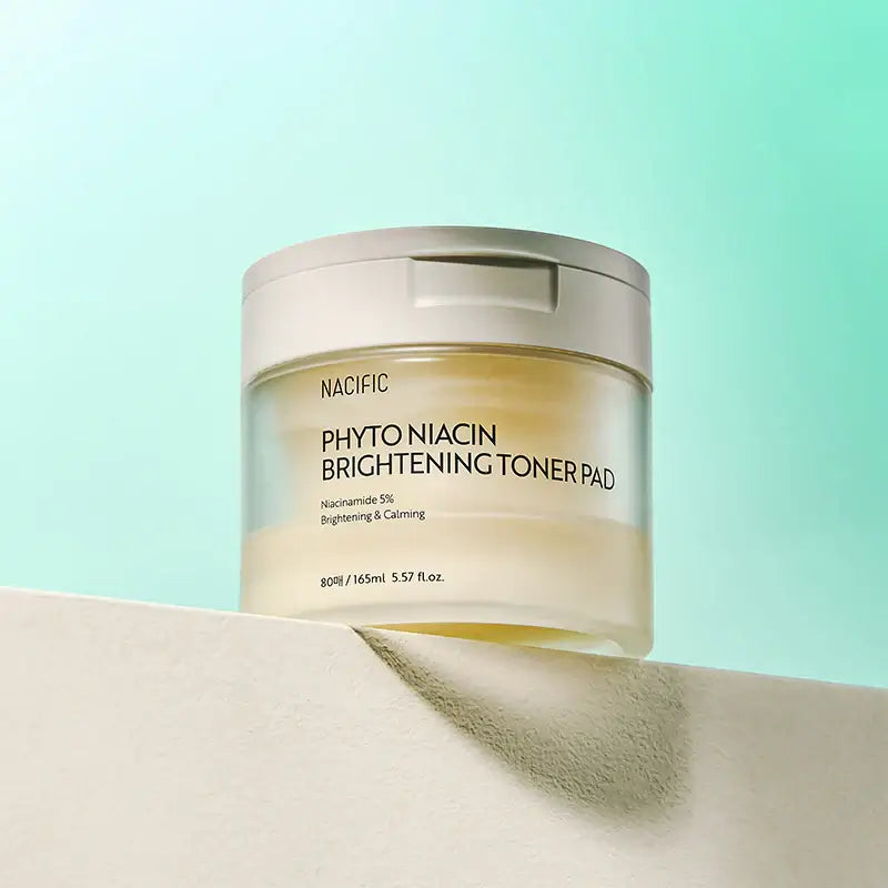 NACIFIC Phyto Niacin Brightening Toner Pads 80 Sheets/165ML on a shelf with green background.