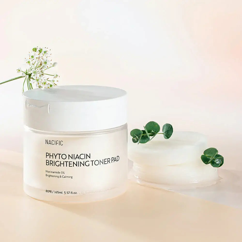 NACIFIC Phyto Niacin Brightening Toner Pads 80 Sheets/165ML on display with botanical elements for a fresh skincare routine.