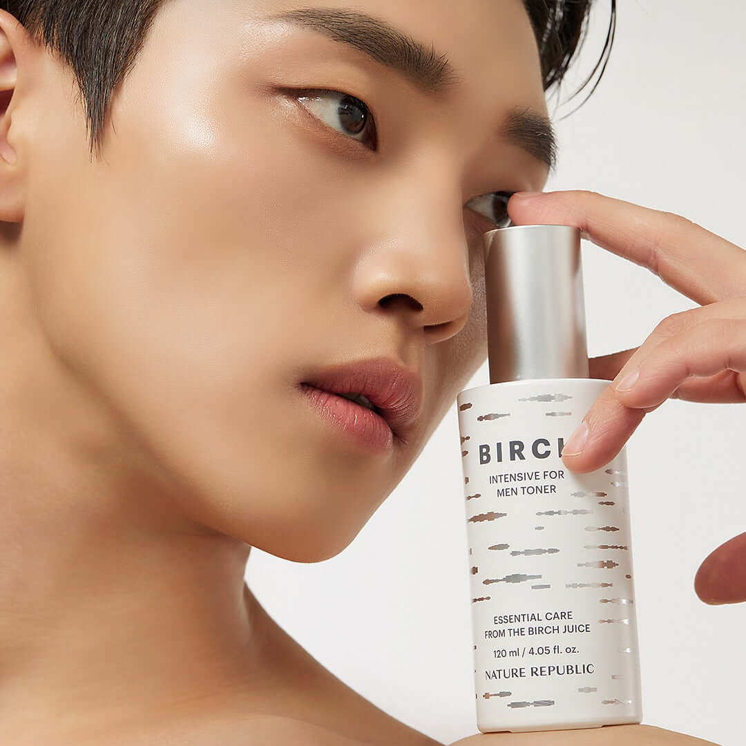 NATURE REPUBLIC Birch Intensive For Men Toner 120ml in use by a male model, showcasing the product's application and skincare benefits.