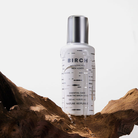 NATURE REPUBLIC Birch Intensive For Men Toner 120ml in white bottle on wood display by Gentleman Korea, men’s Korean skincare toner