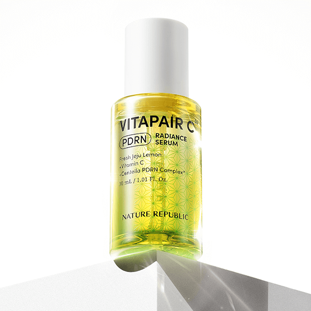 NATURE REPUBLIC Vitapair C PDRN Radiance Serum 30ml bottle on reflective surface
