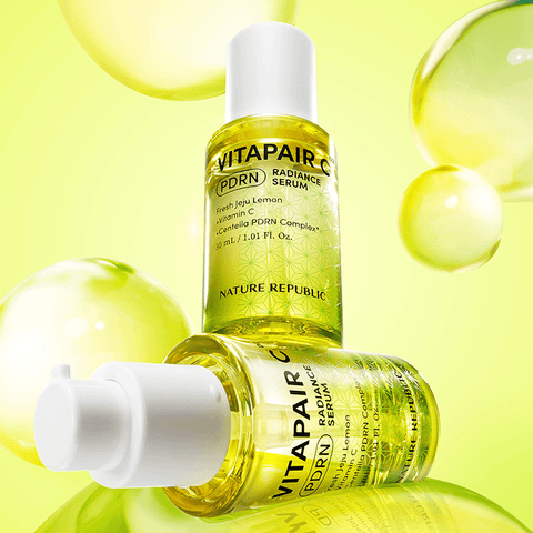 NATURE REPUBLIC Vitapair C PDRN Radiance Serum 30ml bottles with vibrant yellow background