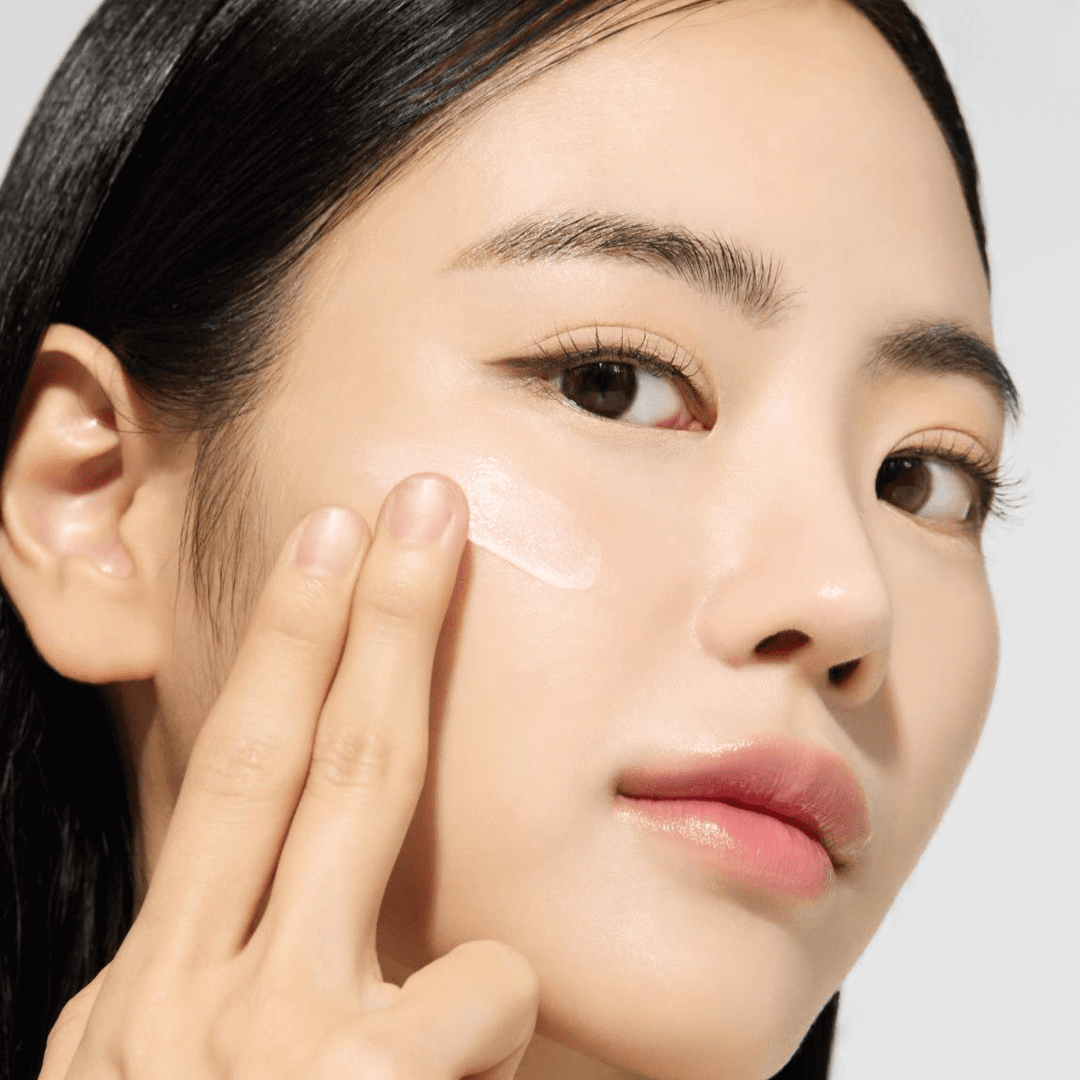 Applying NATURE REPUBLIC Vitapair C Pure Vitamin C 20 Whitening Ampoule 24ml for radiant skin