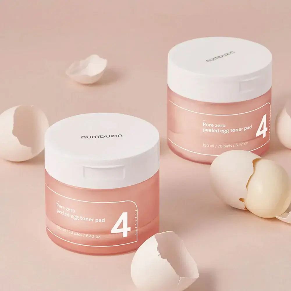 NUMBUZIN No.4 Pore Zero Peeled Egg Toner Pad with egg shells, skincare product for pore tightening and smoothing.