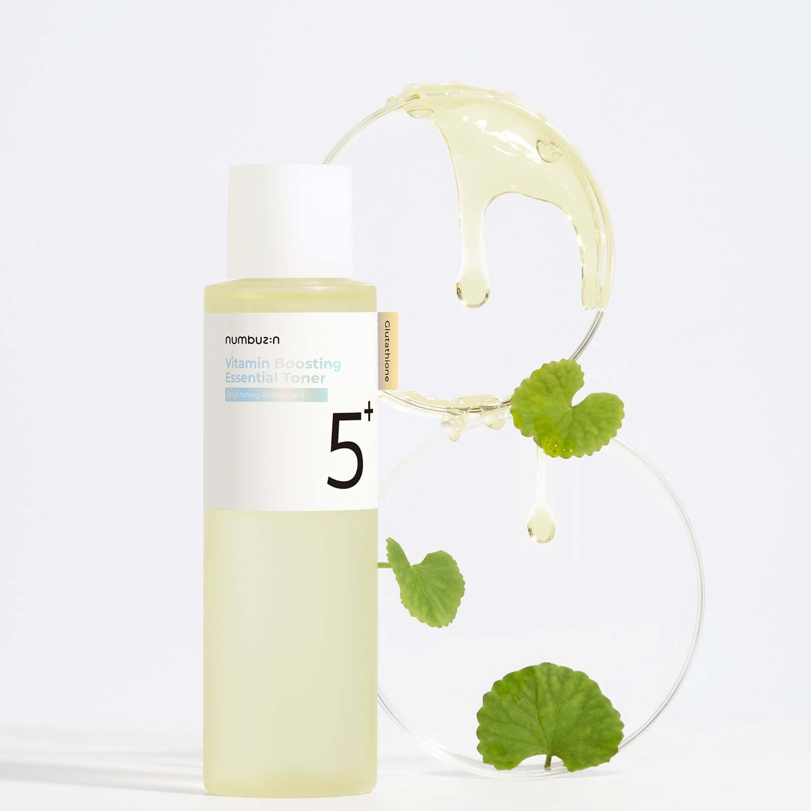 NUMBUZIN No.5 Vitamin Boosting Essential Toner bottle with fresh droplets and leaves for skincare
