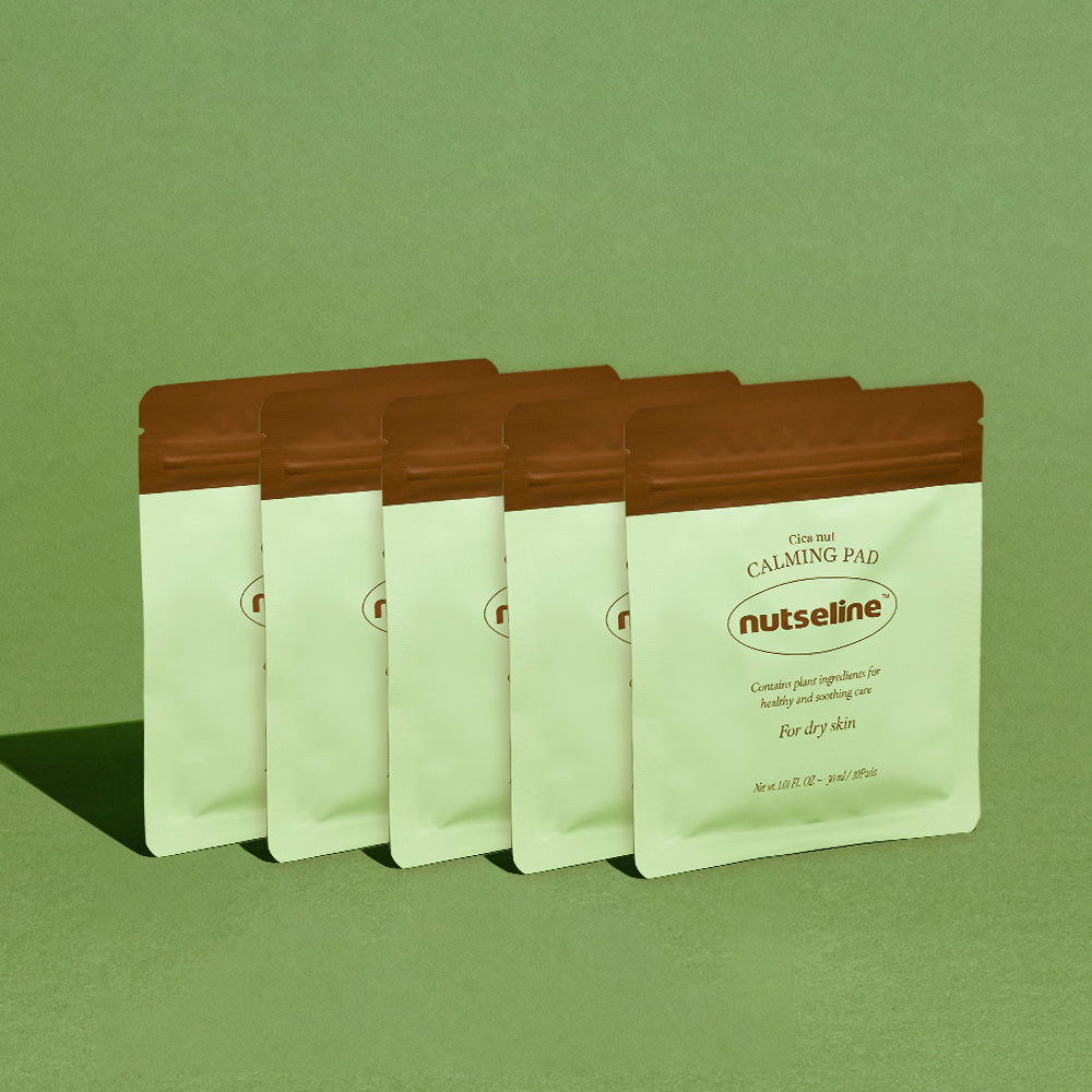 NUTSELINE Cica Nut Calming Pads on display against a green background