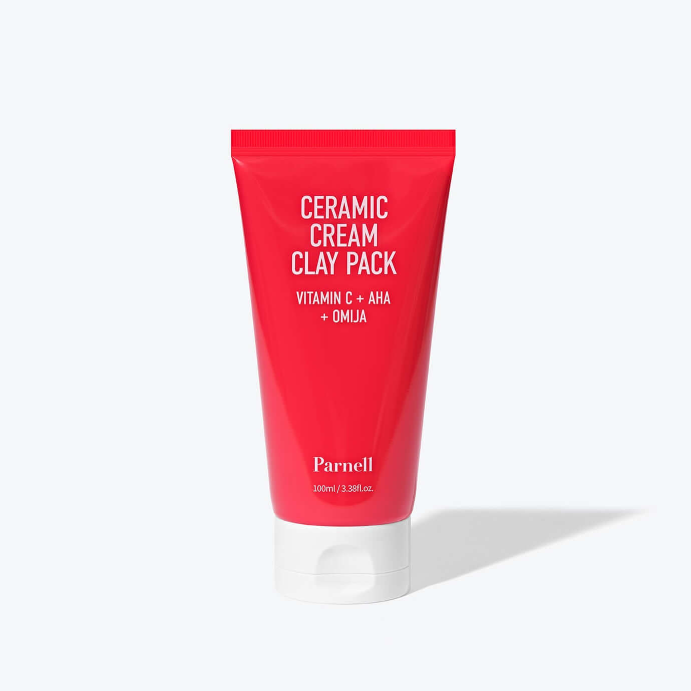 PARNELL AHA Omija Ceramic Cream Clay Pack 100ml tube with red packaging, featuring Vitamin C, AHA, and Omija ingredients.