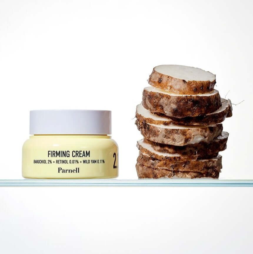 PARNELL Bakuchiol Retinol Wild Yam Firming Cream 50ml jar next to sliced wild yam, skincare product for firming and anti-aging