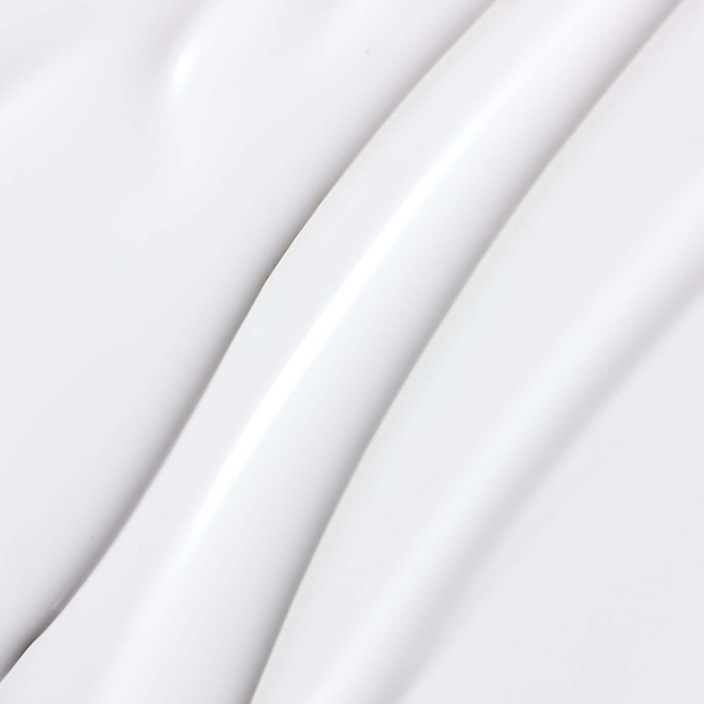 Texture of PARNELL Niacinamide 4.12 Rice Brightening Ampoule Toner 200ml on a smooth surface