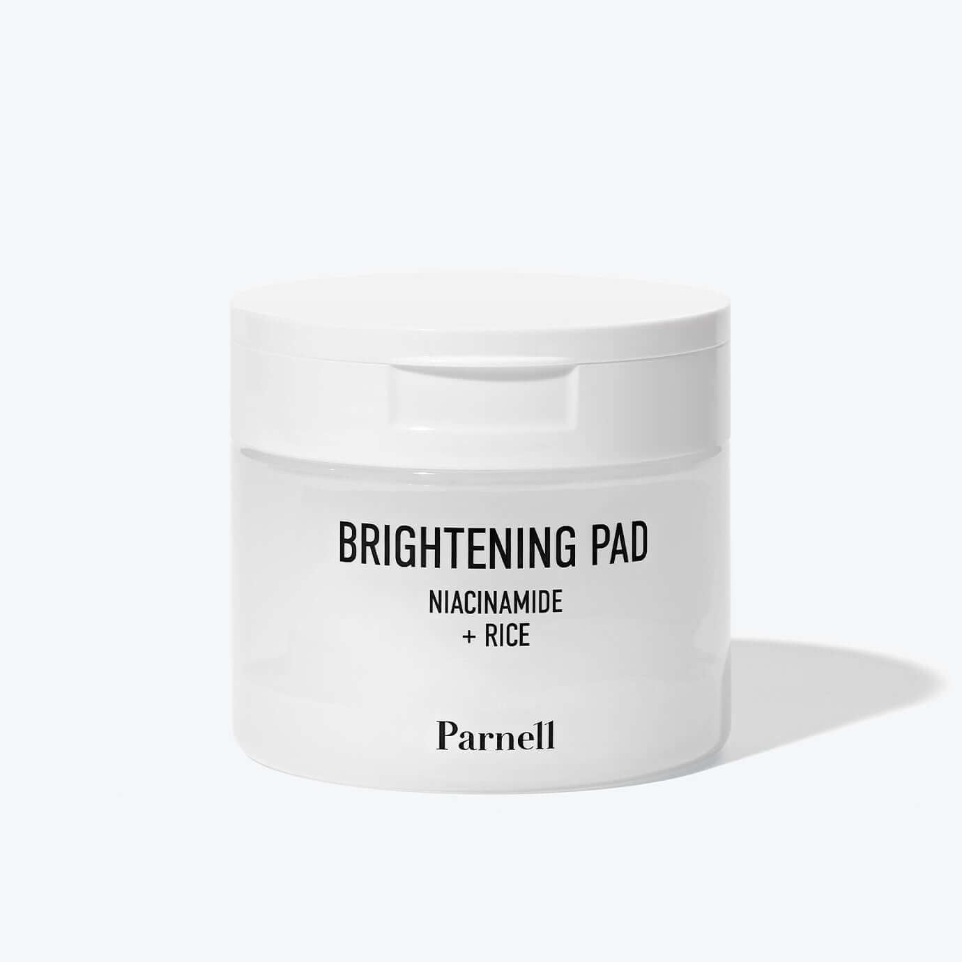 PARNELL Niacinamide Rice Brightening 60 pads, skincare jar showcasing the brightening effect with niacinamide and rice extract.