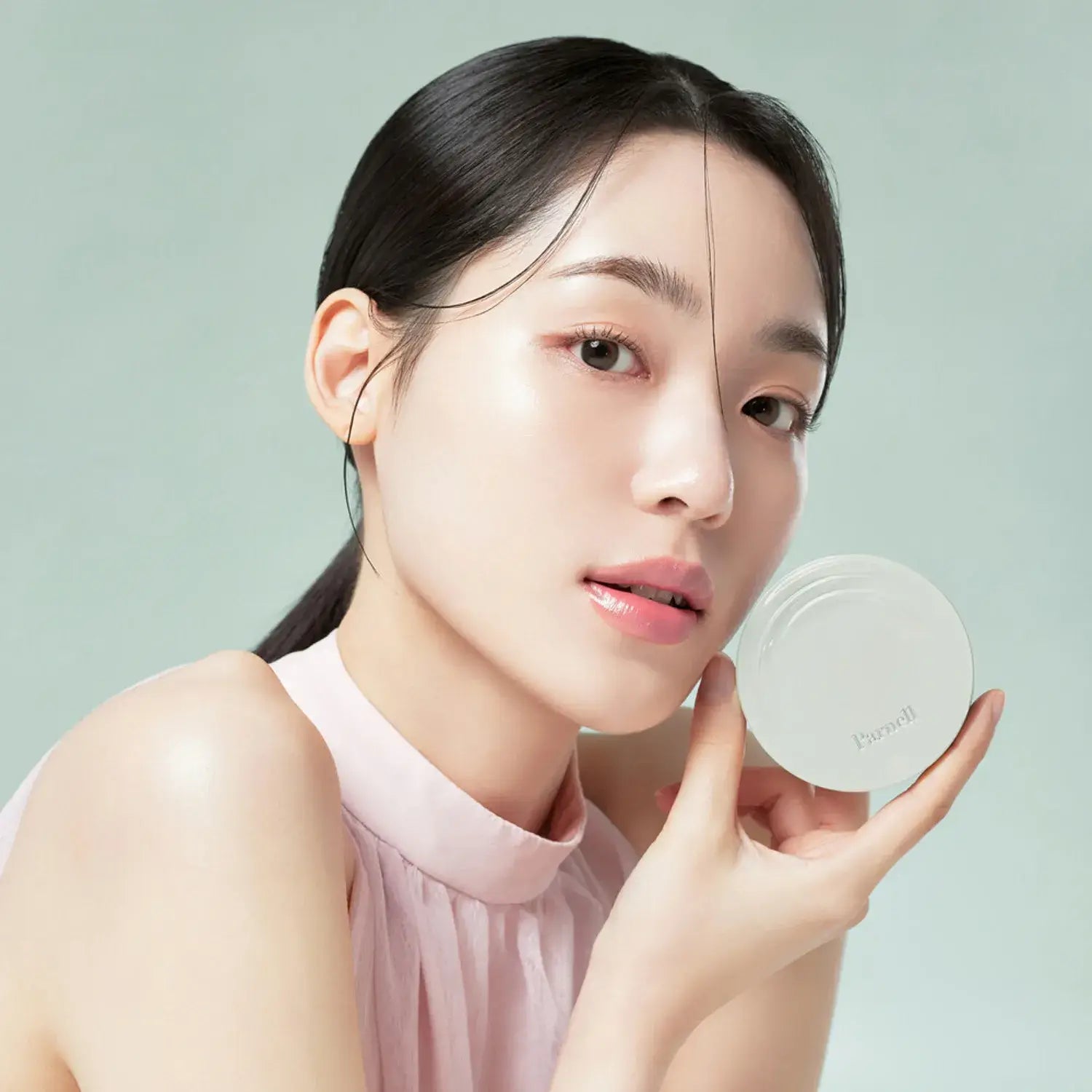 Model displaying PARNELL Serum In High Glow Cushion 15g