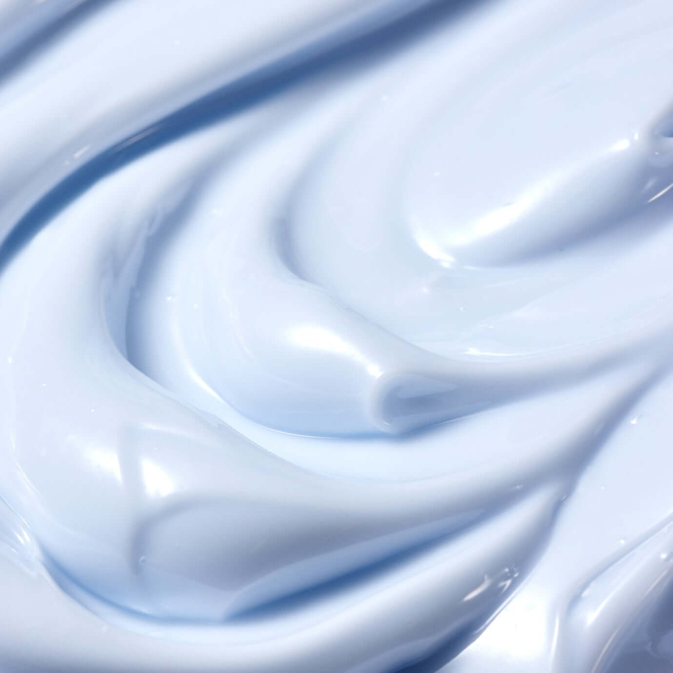 Texture of PARNELL Squalane 15.13 Mineral Water Moisture Cream 50ml showing a smooth, creamy consistency in a light blue shade.