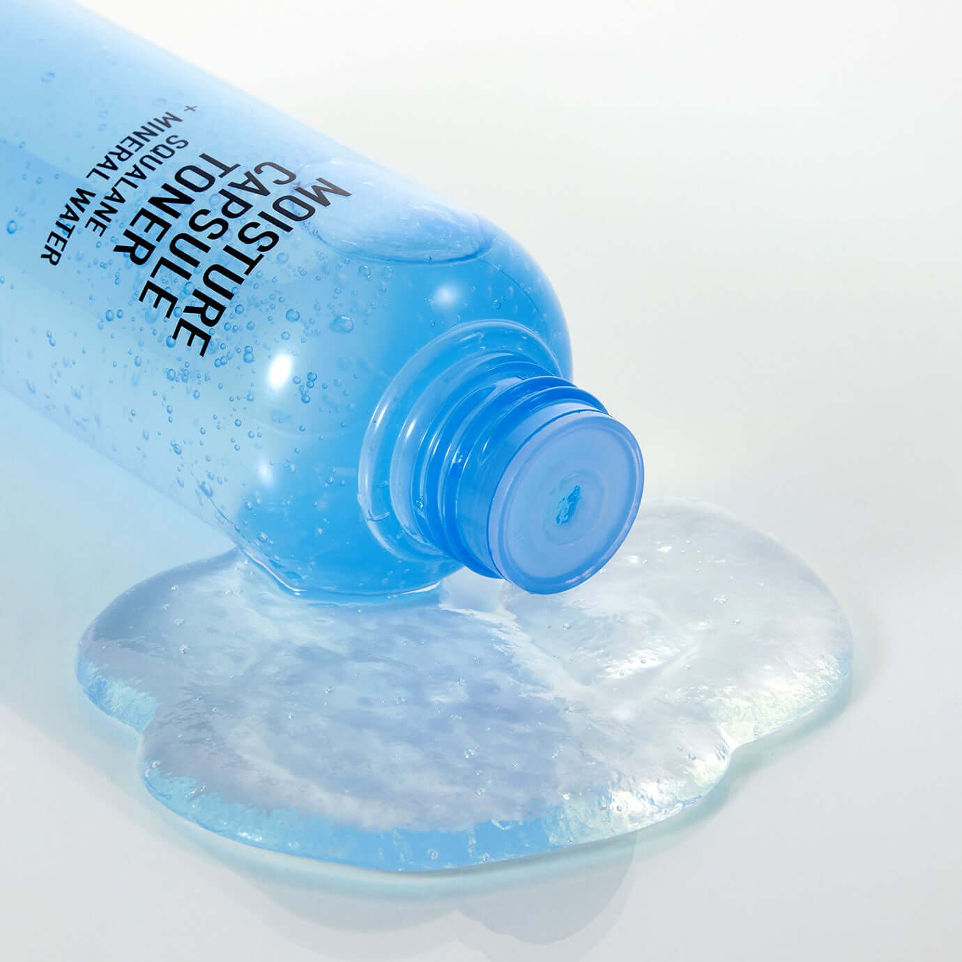 PARNELL Squalane Mineral Water Moisture Capsule Toner 200ml bottle with liquid spilled on surface