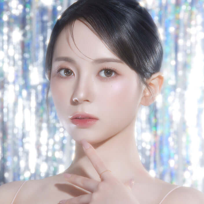 Model showcasing radiant glow using PEACH C Dual Beam Highlighter.