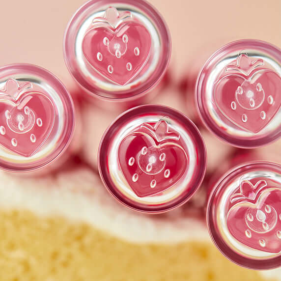 PERIPERA Ink Mood Glow Tint #Softberry Collection featuring pink berry-themed packaging, showcasing vibrant and glossy lip products.