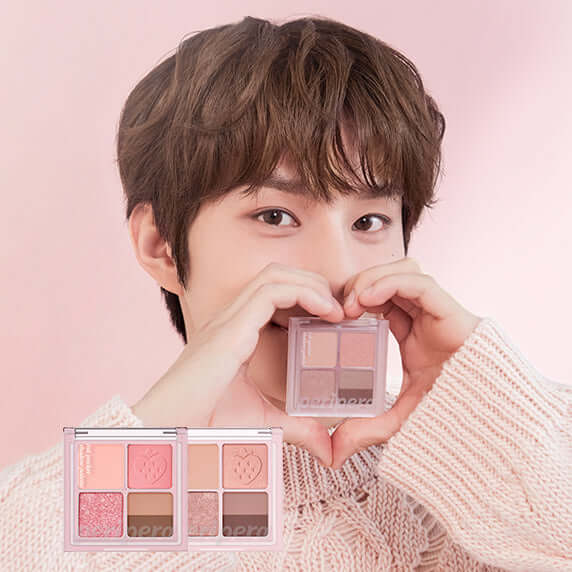 Person holding PERIPERA Ink Pocket Shadow Palette #Softberry Collection with pink background.