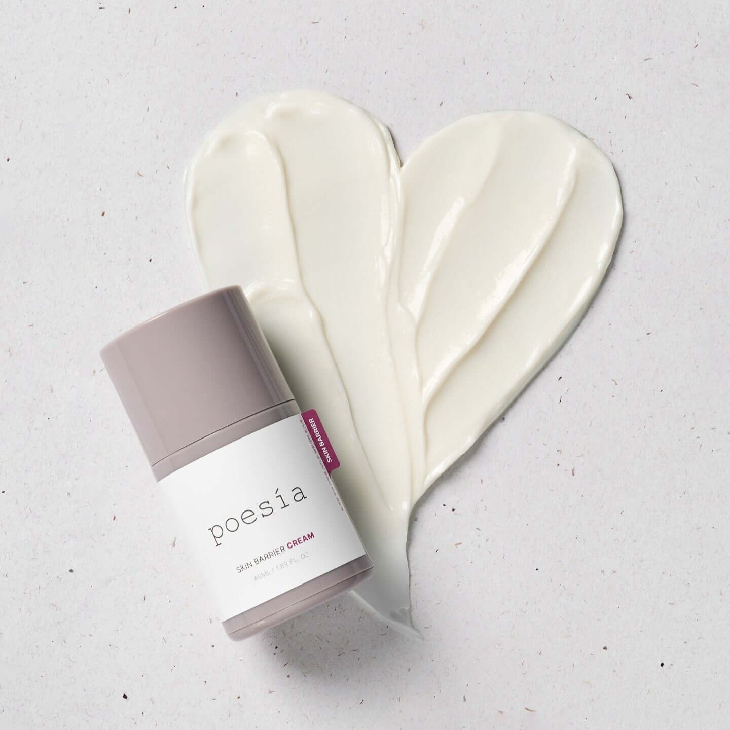POESÃA Ceramide 3 Liposome Intensive Skin Barrier Cream 48ml next to heart-shaped cream smear