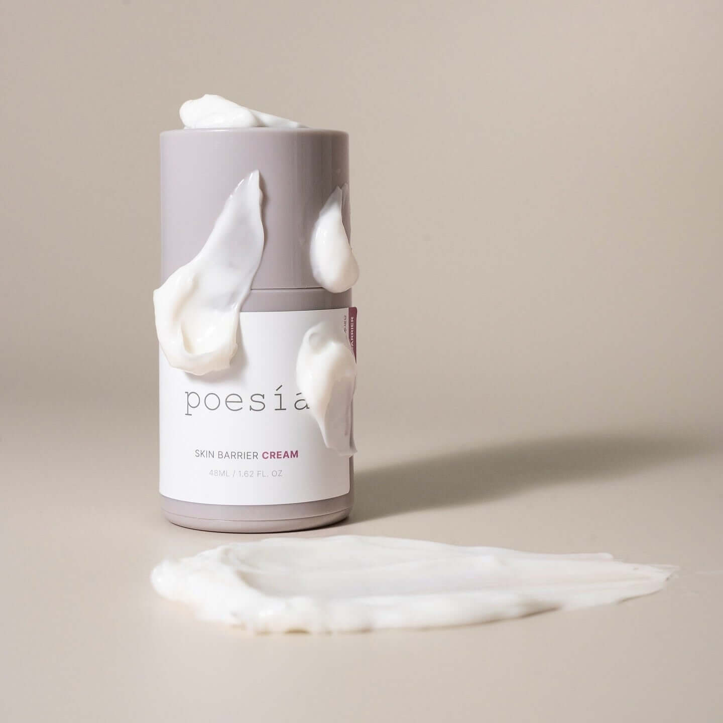 POESÃA Ceramide 3 Liposome Intensive Skin Barrier Cream 48ml bottle with cream swirls on a neutral background