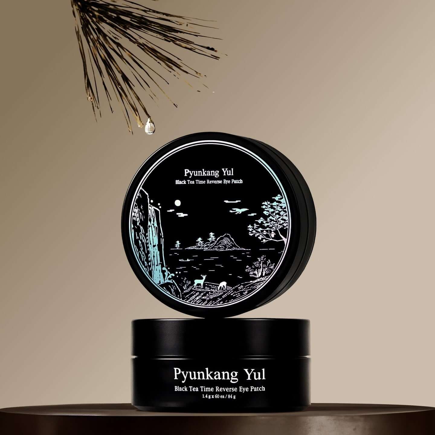 PYUNKANG YUL Black Tea Time Reverse Eye Patch 60 Sheets in elegant packaging on a pedestal