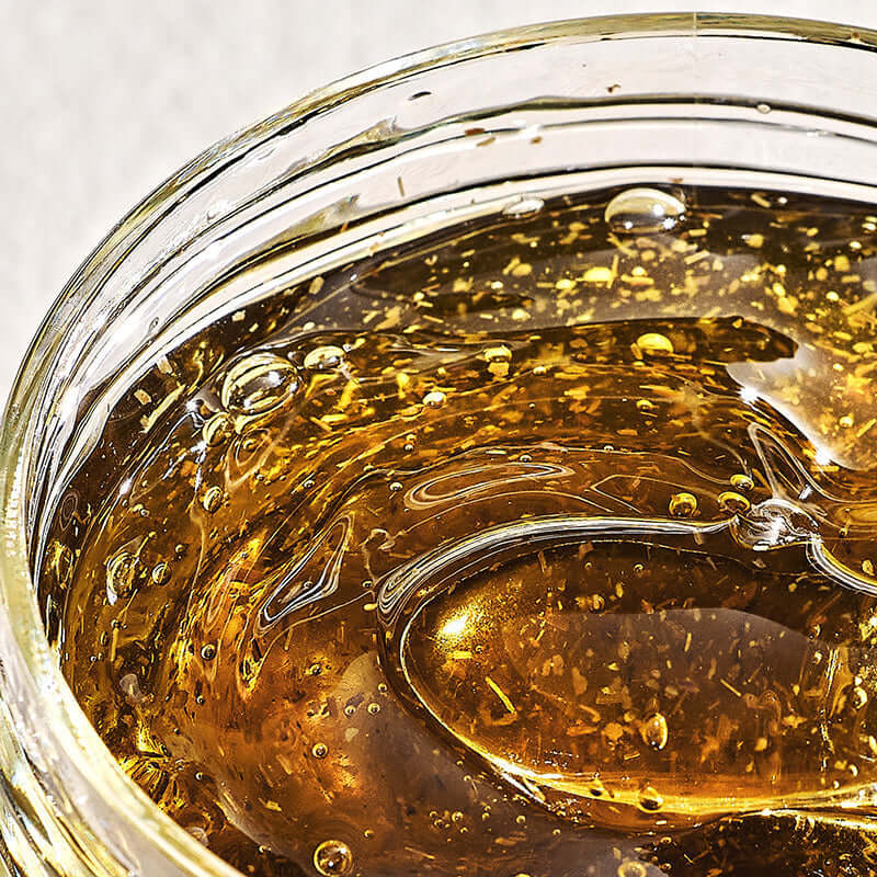 Close-up of PYUNKANG YUL Calming Relief Gel Wash-Off Pack 100g texture in a jar, highlighting its soothing and calming properties.