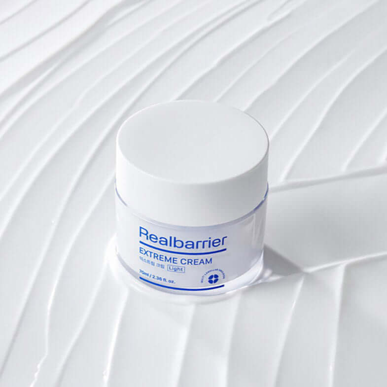 REAL BARRIER Extreme Cream 50ml product image, showcasing a jar on a textured surface, ideal for skincare enthusiasts.