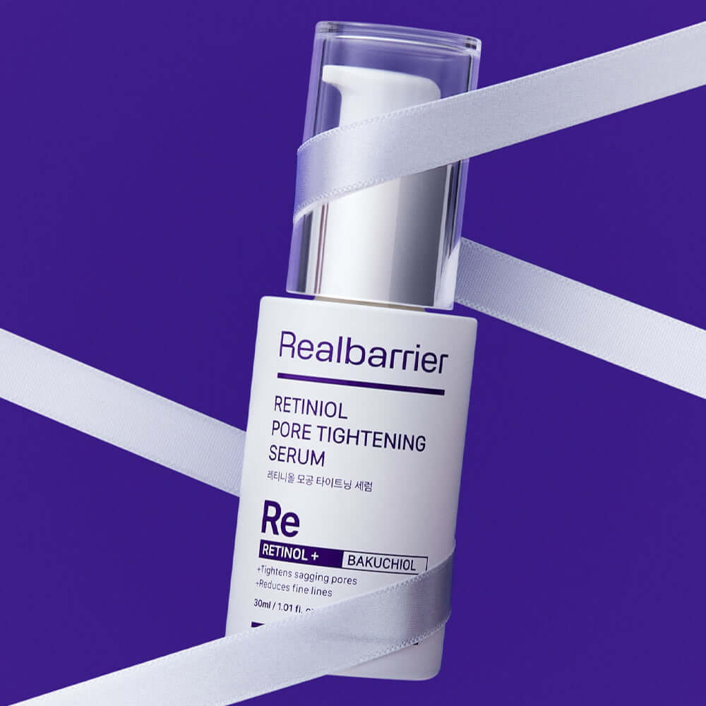 REAL BARRIER Retinol Pore Tightening Serum 30ml bottle on purple background with white ribbon