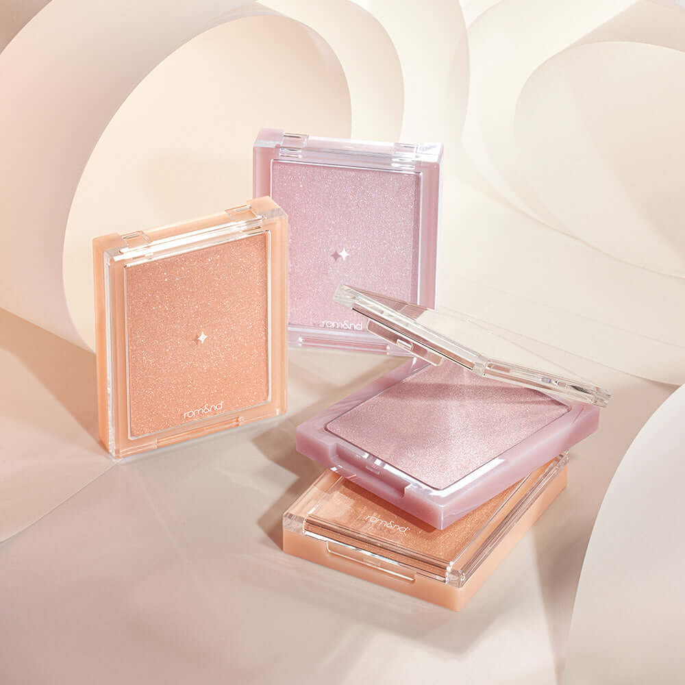 ROMAND see-through veil lighter showcased in elegant packaging with soft pastel colors.