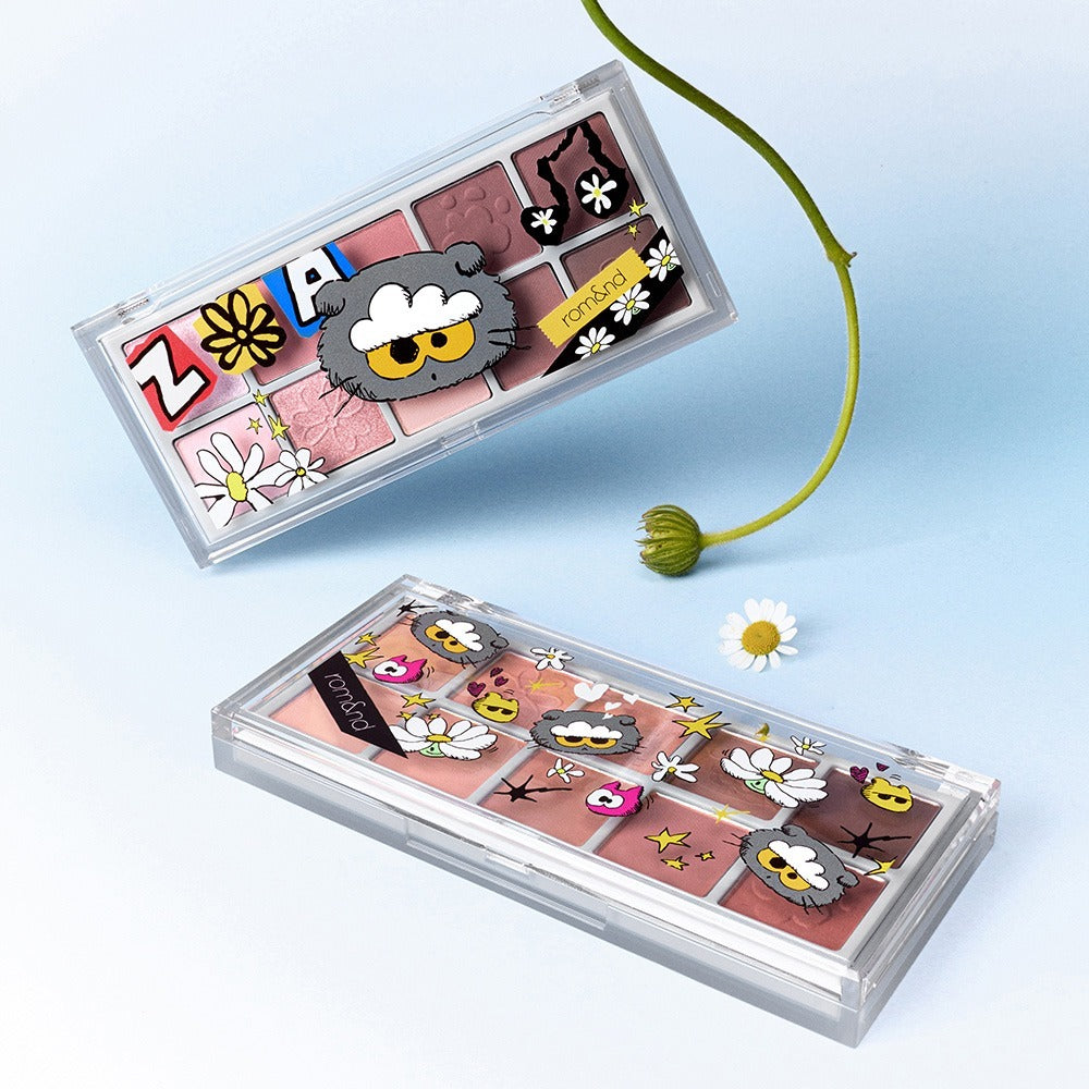 ROMAND x Joanne Friends Better Than Palette with floral and cartoon designs, showcasing vibrant colors in a clear case