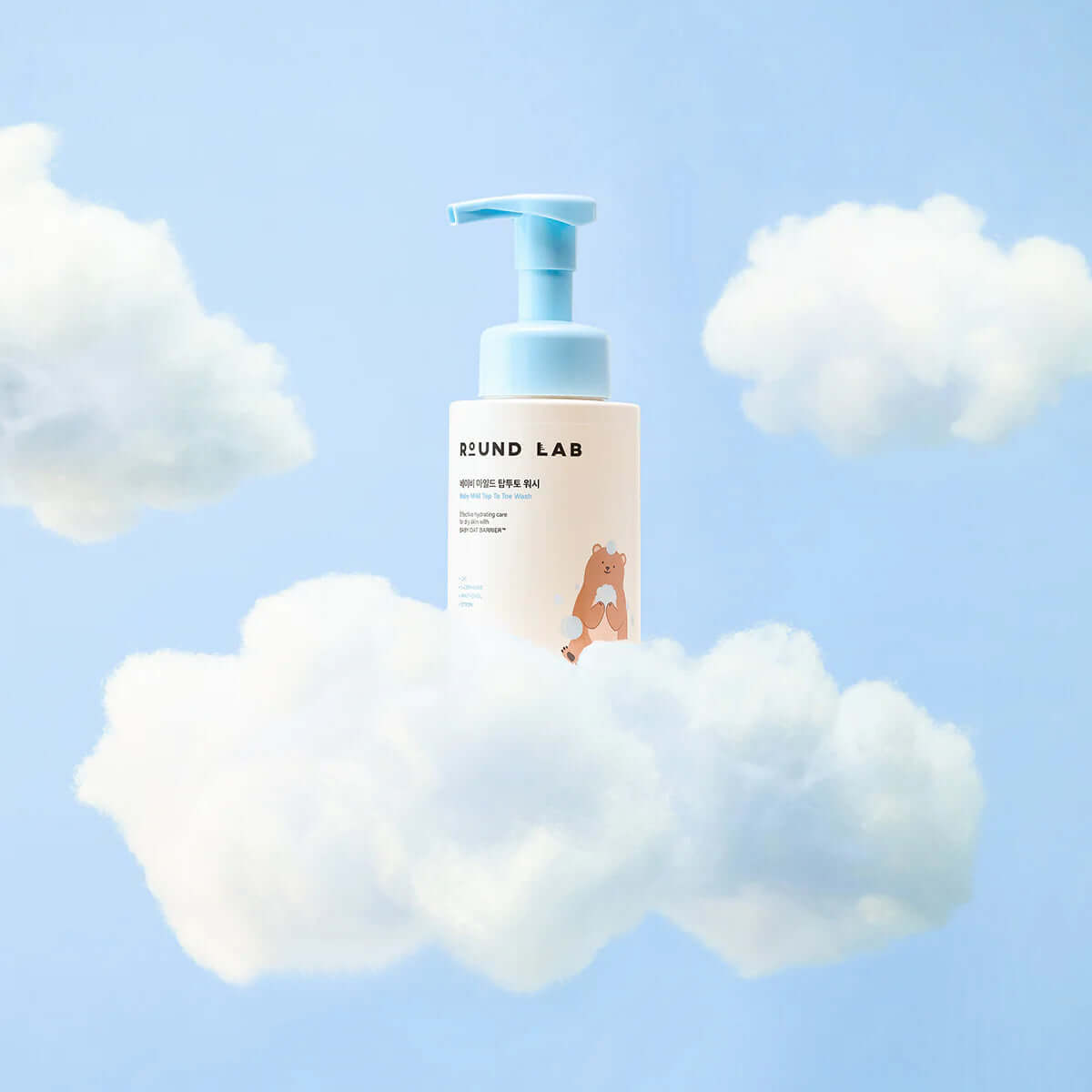 ROUND LAB Baby Mild Top To Toe Wash 300ml in a sky with clouds