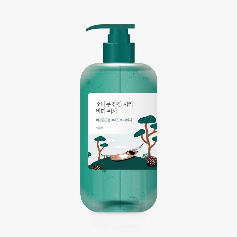 Image of ROUND LAB Pine Calming Cica Body Wash 400ml in a green bottle with a relaxing design.