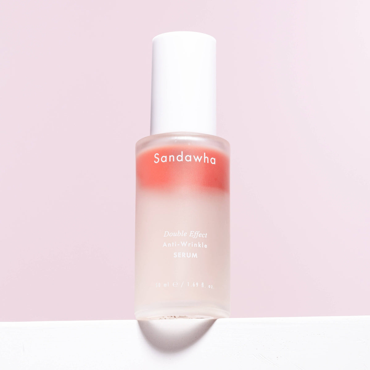 SANDAWHA Double Effect Anti Wrinkle Serum 50ml bottle on pink background