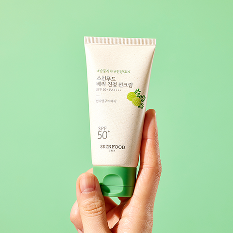 SKINFOOD Berry Smoothing Sun Cream 50ml displayed against a green background, highlighting its SPF 50+ PA+++ protection.
