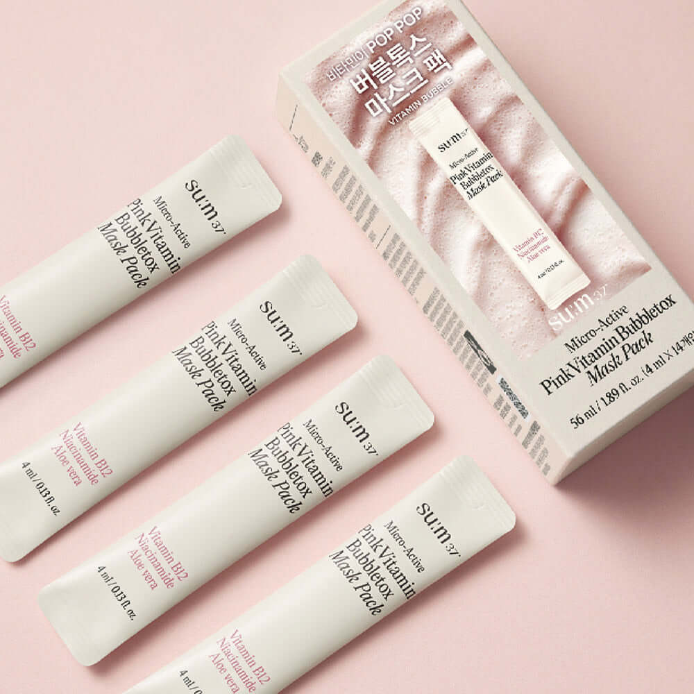SU:M37 Microactive Pink Vitamin Bubble Tox Mask 4ml (14 sheet ) packaging and tubes on a pink background