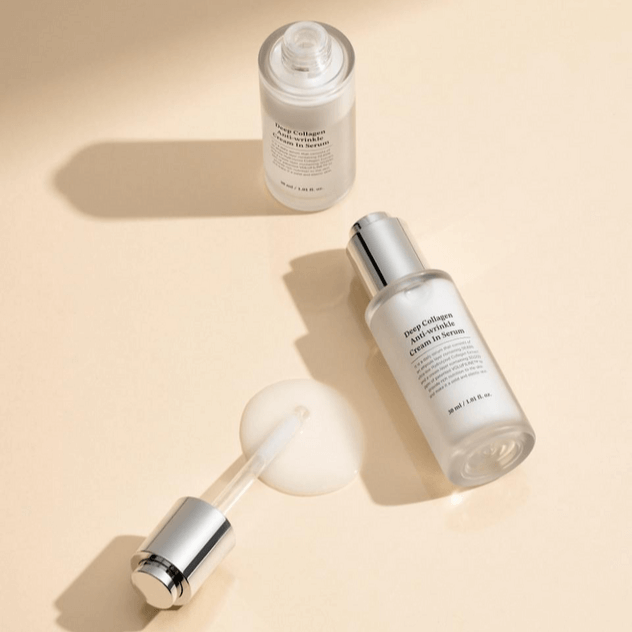SUNGBOON EDITOR Deep Collagen Anti-Wrinkle Cream In Serum 30ml bottle and dropper on beige background
