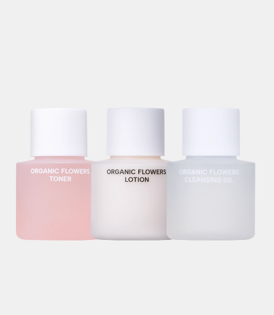 WHAMISA Organic Flowers Mini trial Kit including toner, lotion, and cleansing oil bottles displayed on a light background.