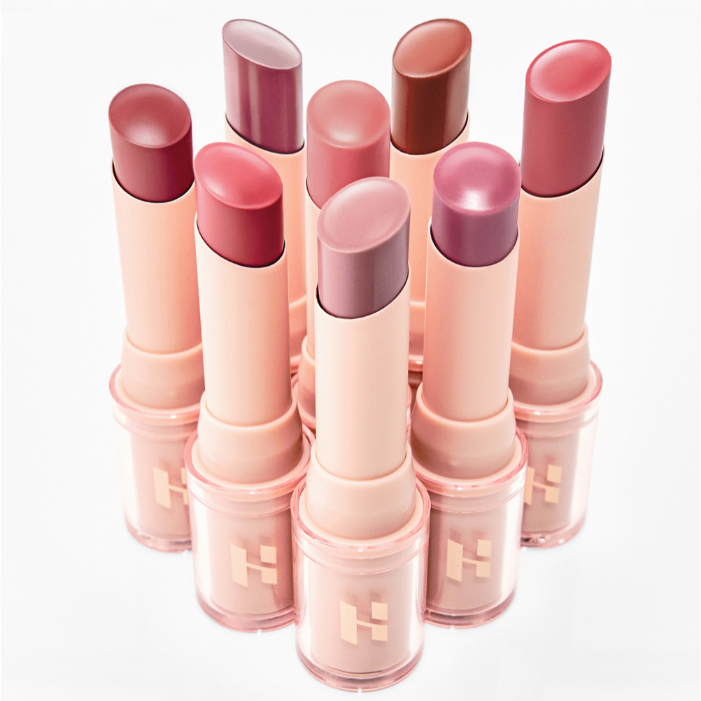 Set of 8 HOLIKA HOLIKA Glow Rise Balm lipsticks arranged showcasing various colors.